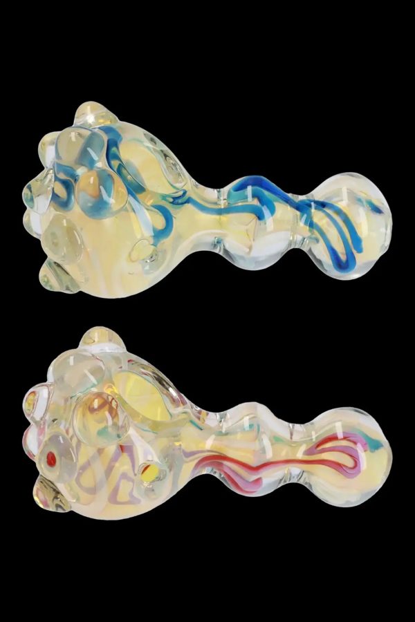 Two colorful glass pipes with sculpted, organic shapes and swirling patterns, isolated on a black background.
