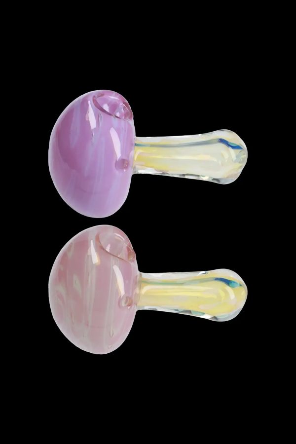 Two iridescent pink and lavender glass smoking pipes against a black background.