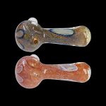 Two glass smoking pipes with colorful, swirled patterns against a black background.