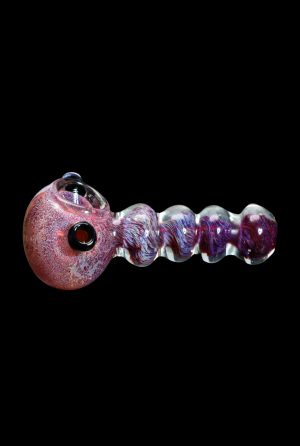 Hand pipe with colorful glass and textured bowl.