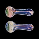 Two glass smoking pipes with colorful swirls, isolated on a black background.
