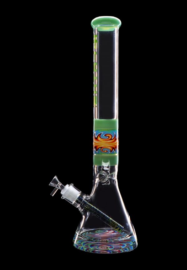 A tall, colorful glass bong with intricate swirls and a wide base, set against a black background.
