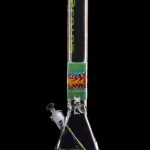 Glass bong with colorful swirling patterns and green accents, isolated on a black background.