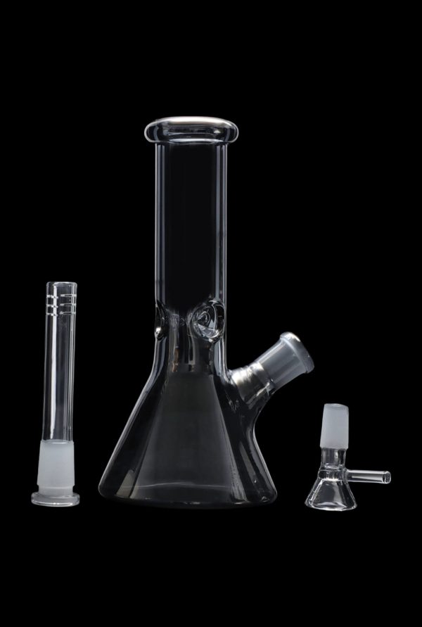 Glass bong with downstem and bowl, isolated on black.