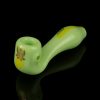 Green glass pipe with gold cannabis leaf detail and reflective surface.