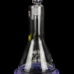 Clear glass bubbler with purple base, featuring intricate internal diffusion structures.