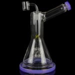 Clear glass water pipe (rig) with purple accents and a quartz banger, isolated on a black background.