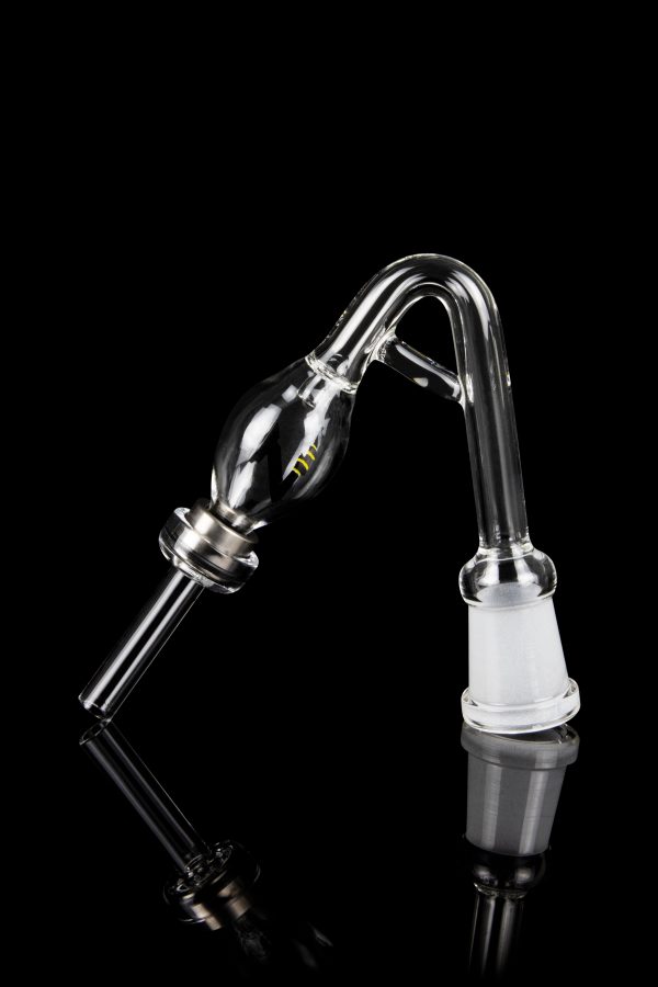 Clear glass oil rig attachment with a rounded reservoir and angled mouthpiece, reflecting on a black surface."