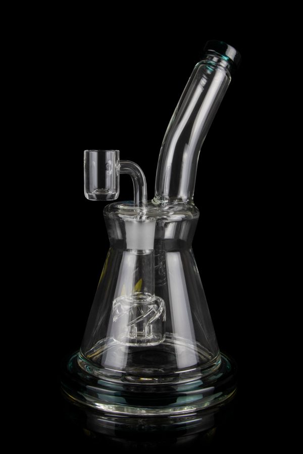 Clear glass water pipe (rig) with intricate bubbler design, isolated on a black background.