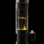 Black and gold cannabis water pipe, labeled "Cloudious9," with visible liquid inside, against a black background.