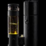 Black Cloudious Hydrology 9 bubbler with carrying case, displaying visible liquid concentrate.