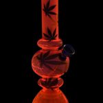 Front view of the Mini Acrylic Bubble Water Pipe with Grinder Base, showcasing its rounded, transparent design against a black backdrop.