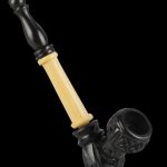 A side view of the Multi Wood Carved Sherlock Pipe shows a curved, wooden stem and carved detailing.