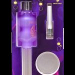 Clear glass cannabis oil rig and accessories packaged on a purple and blue display card with the "Freak Street" logo.