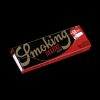 Red pack of Smoking Deluxe rolling papers and tips against a black background.