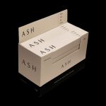 Stacked boxes of “ASH Organic” premium rolling papers on a white background.