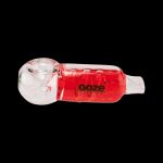 Red glass pipe with "ooze" branding, isolated on a black background.