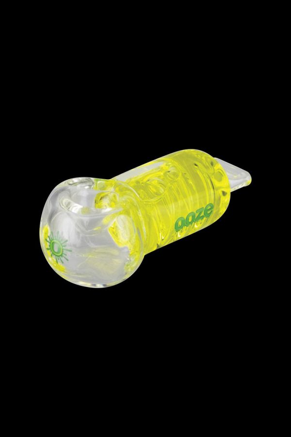 A side view of the Ooze Cryo Freezable Pipe, showcasing its clear glass construction and curved design.