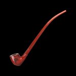 Red glass cannabis smoking pipe with a curved neck and etched logo on the bowl, isolated on a black background.