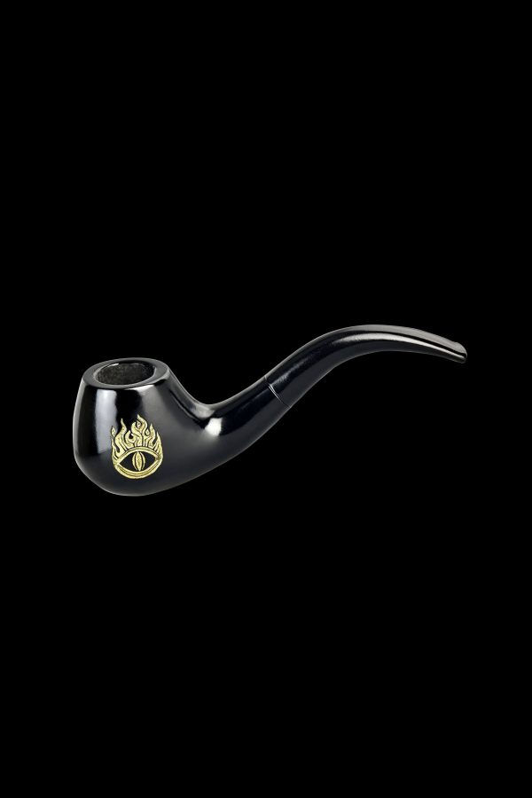 Black glass pipe with a golden eye emblem, isolated on a black background.