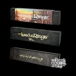 Three branded boxes for “The Lord of the Rings” smoking pipes, stacked and displayed against a black background. The boxes feature elvish script and imagery from the fantasy series.