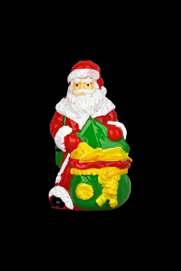 Ceramic Santa Claus sculpture concealing a cannabis grinder and bud.
