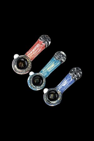 Three glass smoking pipes with colorful, swirled patterns against a black background.