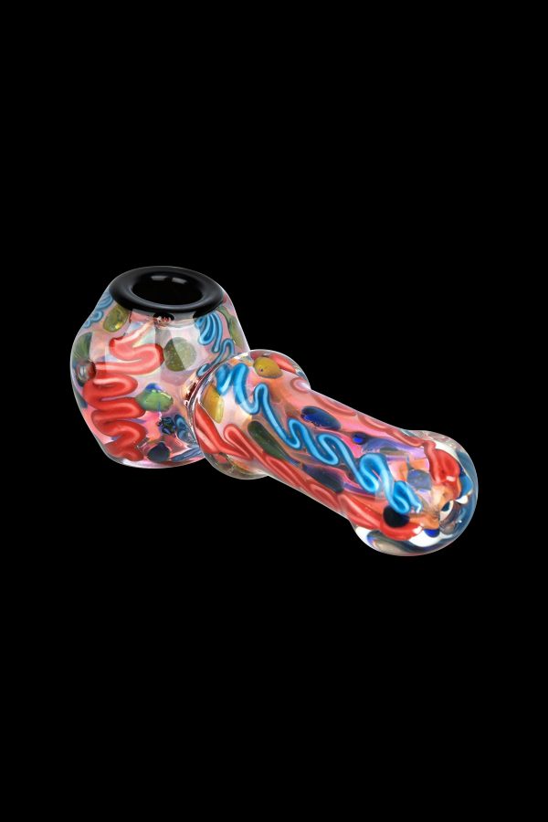 Hand-blown glass pipe with vibrant red, blue, and yellow swirls against a black background.
