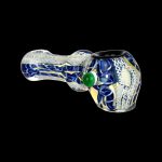 Blue and white glass pipe with green cannabis bud.