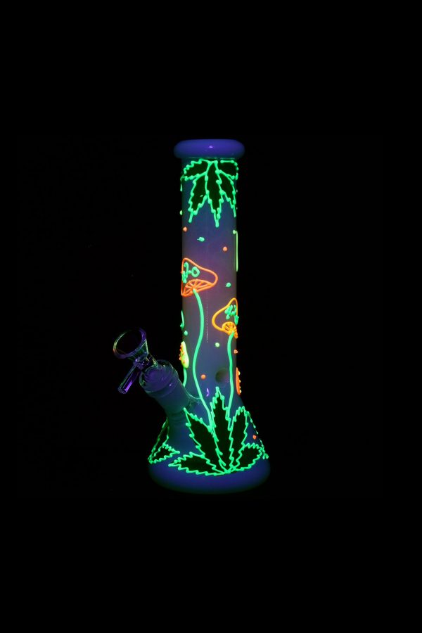 Neon green and orange cannabis leaf and mushroom designs on a glass bong, isolated on black.
