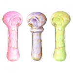 A slightly angled, close-up view of the Pastel Turtle Shell Spoon Pipe, showcasing its colorful, patterned glass design.