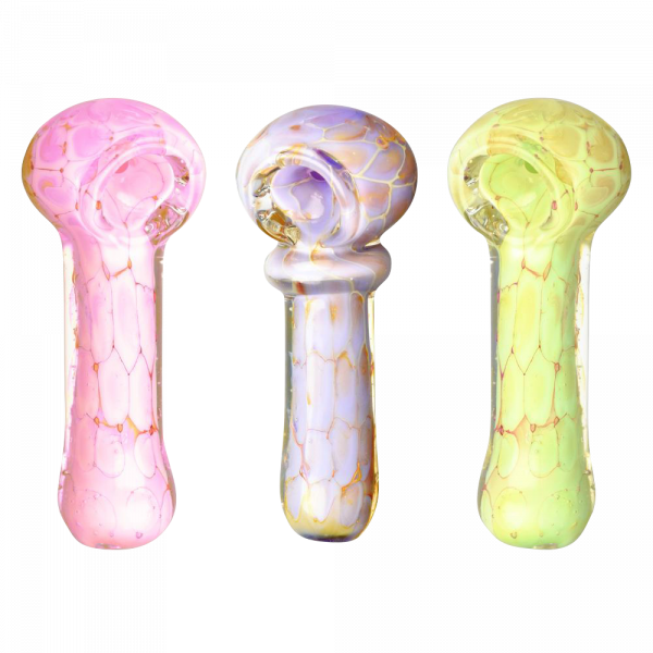 A slightly angled, close-up view of the Pastel Turtle Shell Spoon Pipe, showcasing its colorful, patterned glass design.