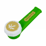 A close-up shows the PieceMaker "Karma" Silicone Pipe in a vibrant green hue, angled slightly from above.