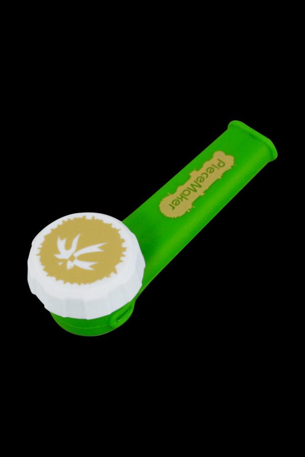 Front view of the PieceMaker "Karma" Silicone Pipe, a small, curved pipe with a textured grip, set against a plain white background.