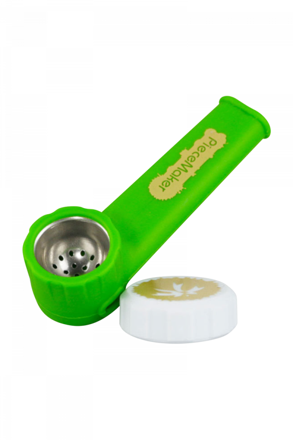 A side view of the PieceMaker "Karma" Silicone Pipe, showing the curved mouthpiece and textured green body.