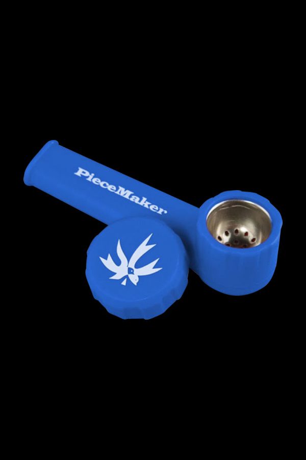 A close-up of the PieceMaker "Karma" Silicone Pipe, showcasing its curved design and dark coloration.