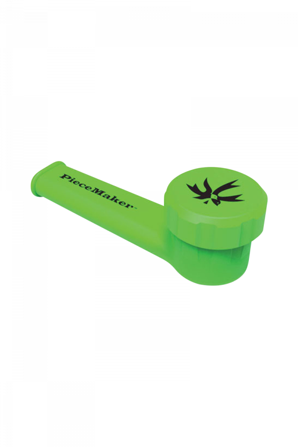 A vibrant, angled close-up of the PieceMaker "Karma" Silicone Pipe, showcasing its curved design and smooth, green texture.