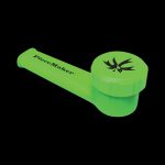 A close-up view of the PieceMaker "Karma" Silicone Pipe, showcasing its curved design and smooth, green finish.