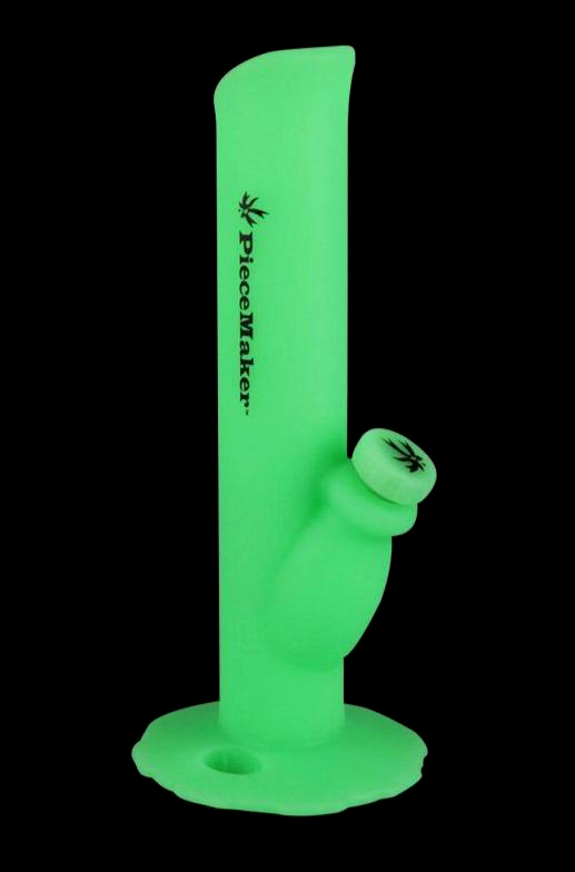 Green glass water pipe with branding.