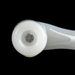 Frosted glass pipe with diffuser downstem, isolated on black.