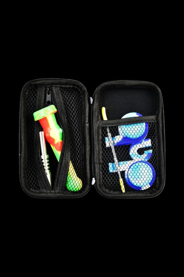 The Portable Silicone Dab Travel Kit is displayed open, revealing a colorful silicone kit neatly arranged inside a zipped black case.