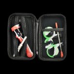 The open Portable Silicone Dab Travel Kit displays a colorful smoking kit against a black, textured background.