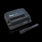 Black Powermatic cigarette rolling machine with open tray and cleaning tool.