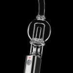 A close-up, angled view of the Pulsar APX Wax/Volt V3 Bubbler Attachment, showcasing its glass bubbler and metallic connection.