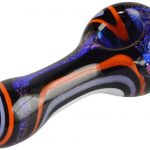 A three-quarter view of the Pulsar Dichro Swirl Spoon Pipe - Outer Space, showcasing its swirling, iridescent dichroic glass design.