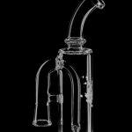 A side view of the Pulsar Petite Pocket Cart Rig Bubbler for Vapes, showcasing its clear glass construction and compact size.