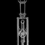 A close-up studio shot of the Pulsar Petite Pocket Cart Rig Bubbler for Vapes, showcasing its clear glass construction and compact size.