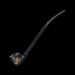 Black glass pipe with gold leaf detailing against a black background.