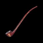 Red glass cannabis smoking pipe with gold detailing on a black background.