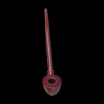 Red wooden pipe for smoking cannabis, isolated on a black background.